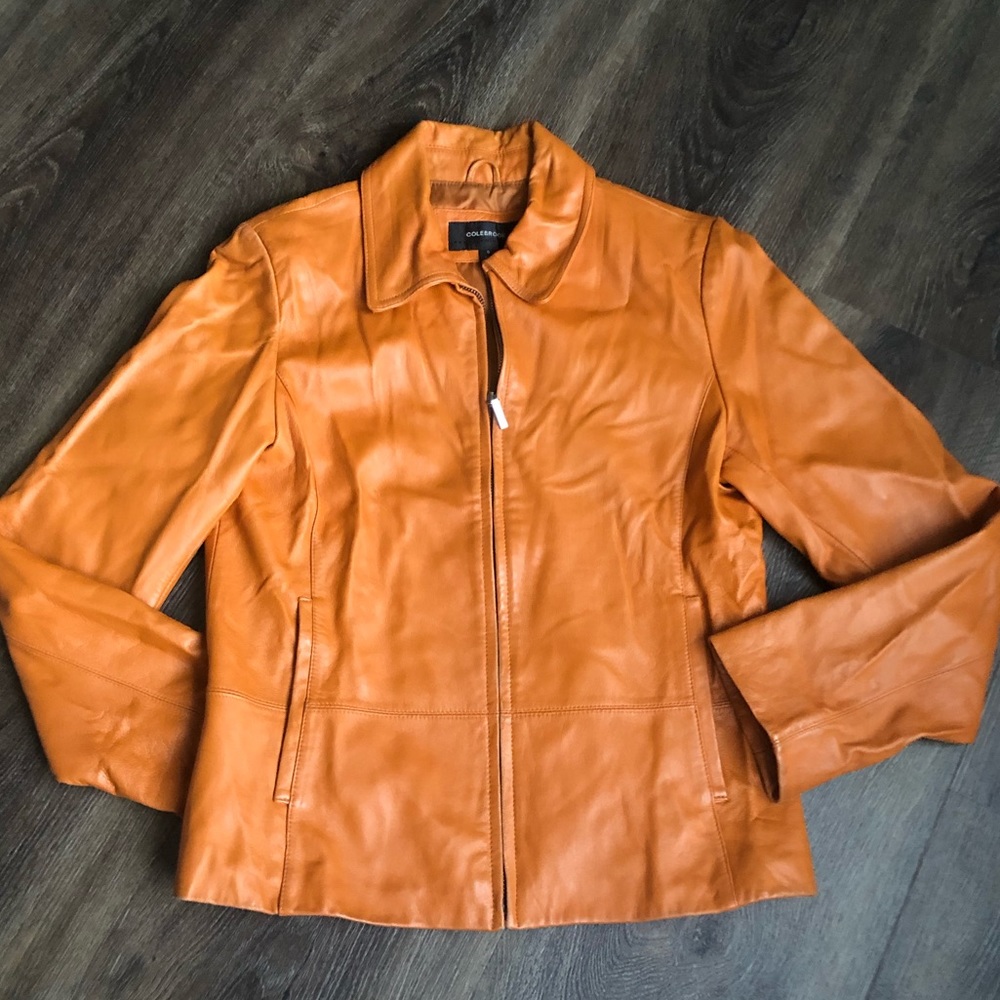 Genuine leather zipper-jacket.